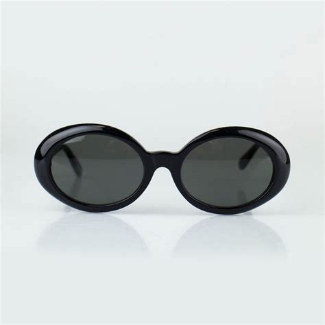 black oval sunglasses designer